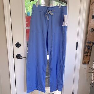 ReSurge SuRay+ women’s size M ceil blue scrub pants.